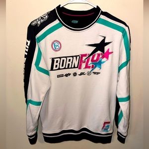 Ski pull over. Arms have a parachute material that adds style and comfort.